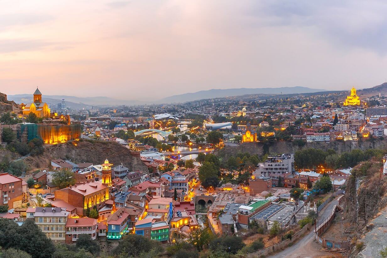 panorama of Georgian capital Tbilisi at sunset