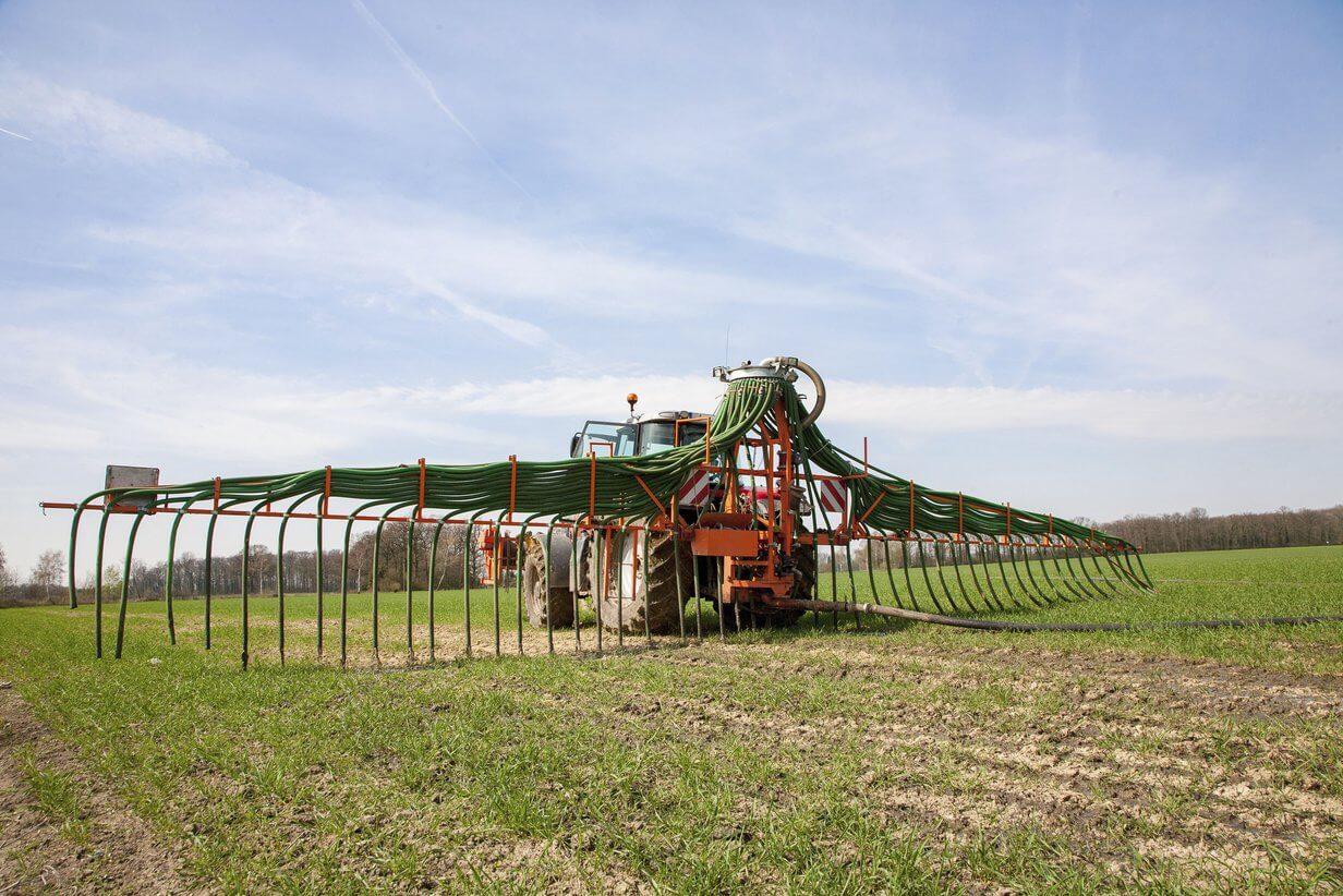 Field is fertilized by machine